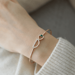 Load image into Gallery viewer, Elegant Diamond and Green Gem Interlocking Bangle in 18K Rose Gold