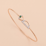 Load image into Gallery viewer, Elegant Diamond and Green Gem Interlocking Bangle in 18K Rose Gold