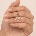 Load image into Gallery viewer, Bloom of Radiance 18K Yellow Gold Diamond Bow Pendant