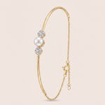Load image into Gallery viewer, Elegant Pearl and Diamond Cluster Chain Bangle in 18K Yellow Gold
