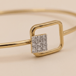Load image into Gallery viewer, Modern Geometric Diamond Square Bypass Bangle in 18K Yellow Gold
