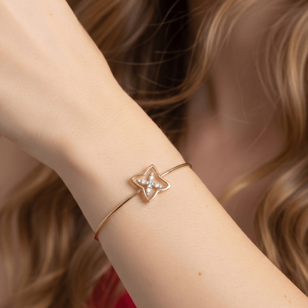 Modern Diamond Interlocking Floral Star Bangle in 18K Yellow Gold