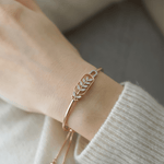 Load image into Gallery viewer, Elegant Diamond Botanical Fern Bolo Bracelet in 18K Rose Gold

