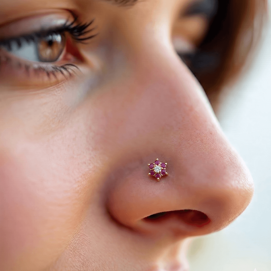 Vibrant red zirconia and diamond floral nose pin in 18k yellow gold