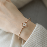 Load image into Gallery viewer, Modern Geometric Diamond Interlocking Rhombus Bangle in 18K Yellow Gold
