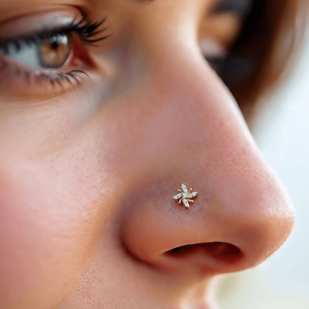 Dynamic diamond pinwheel nose pin in 18k yellow gold