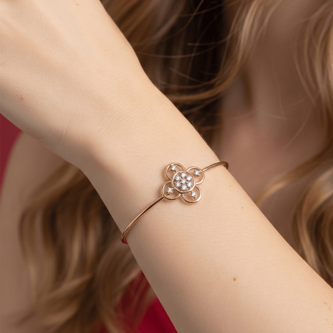 Elegant diamond floral quatrefoil openable bangle in 18k rose gold