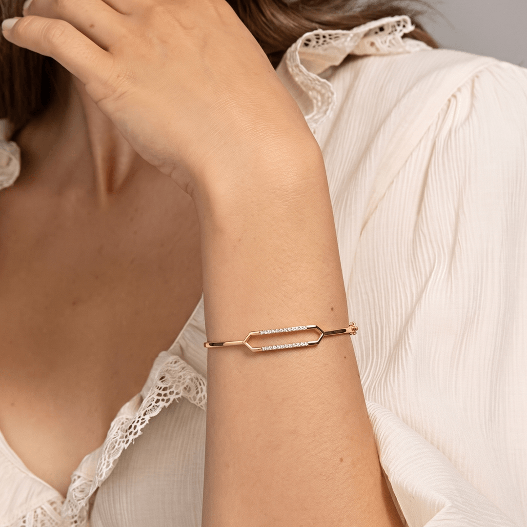 Sleek geometric parallel diamond bar bangle in 18k yellow gold