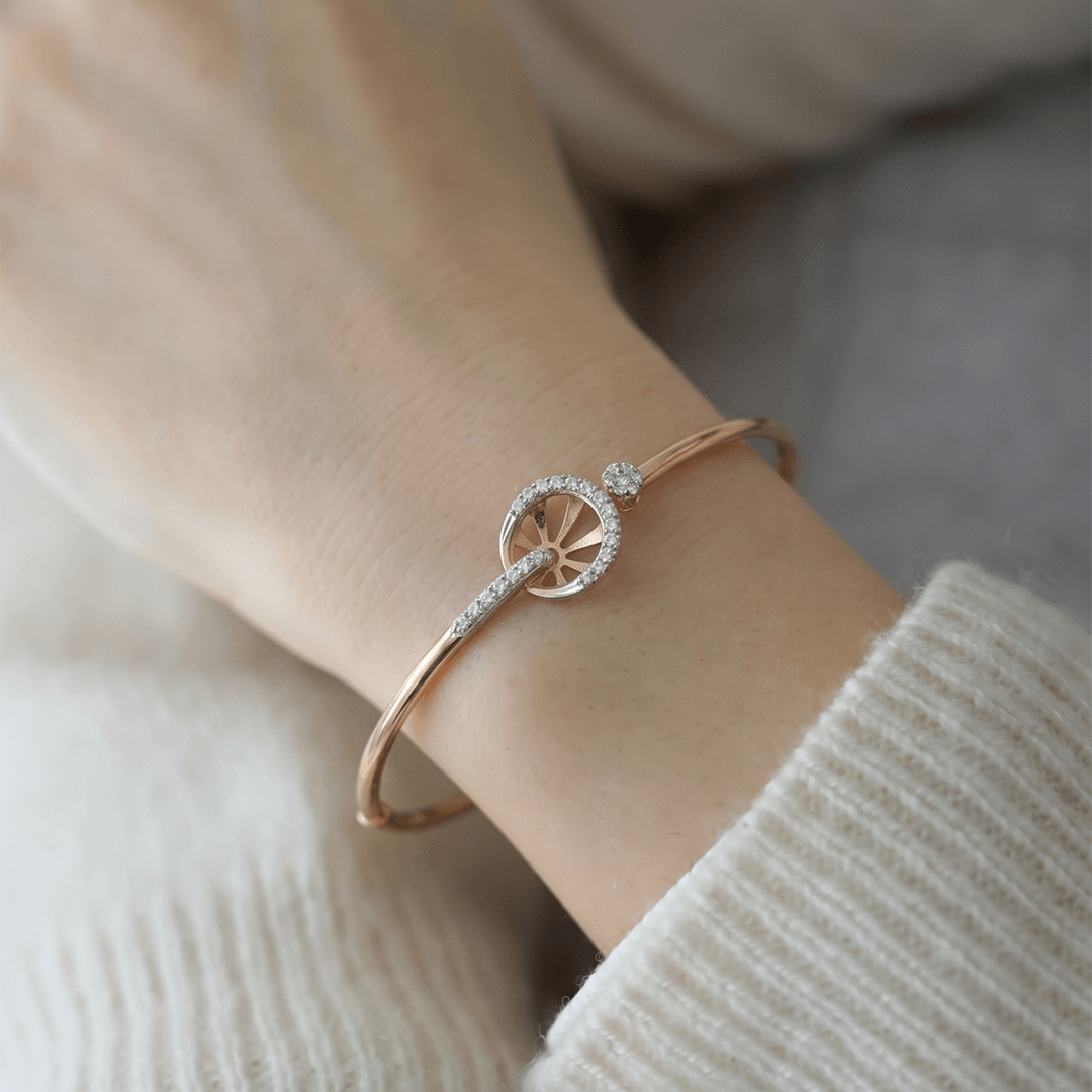 Modern diamond sunburst circle interlocking bangle in 18k rose gold