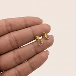 Load image into Gallery viewer, Sculpted Ribbon Twist 18K Yellow Gold Diamond Stud Earrings
