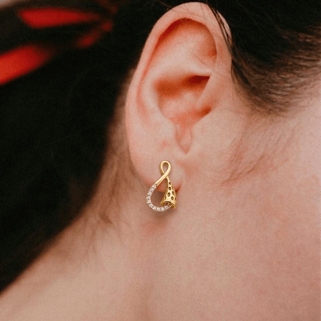 Sculpted ribbon twist 18k yellow gold diamond stud earrings