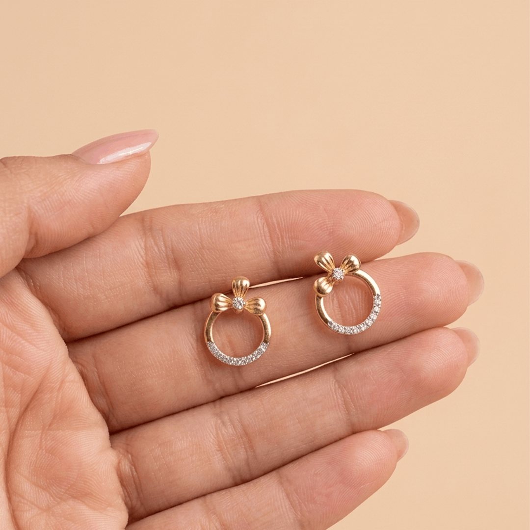 Delicate ribbon halo 18k yellow gold diamond stud earrings