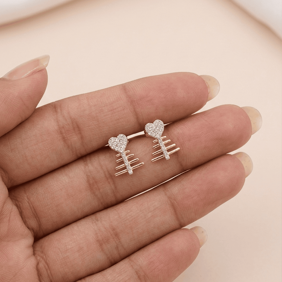 Whimsical Heart Fishbone Diamond Stud Earrings in 18K Yellow Gold