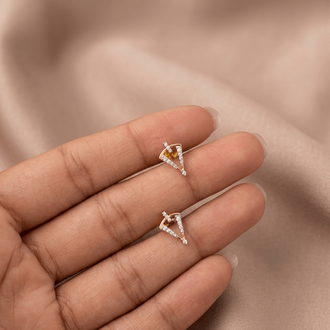 Modern geometric chevron diamond stud earrings in 18k yellow gold