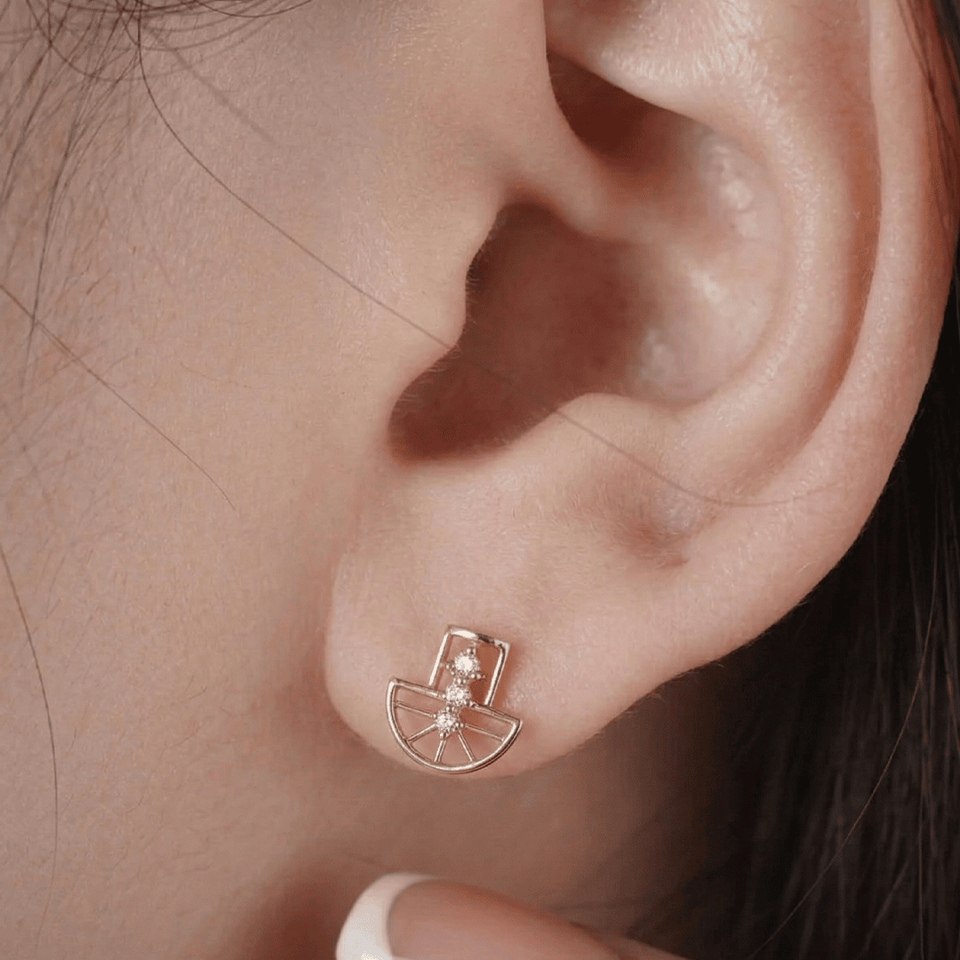 Geometric art deco diamond stud earrings in 18k rose gold