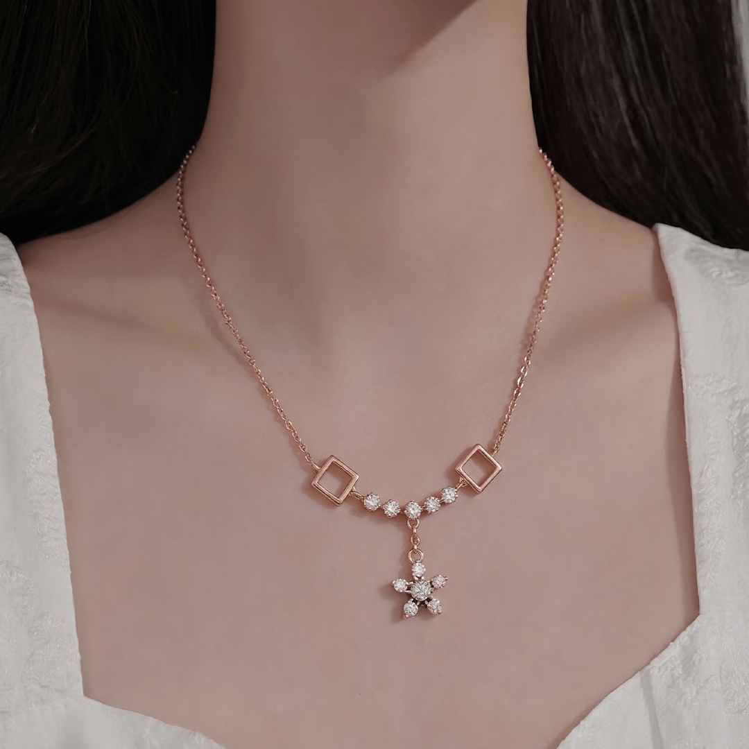 Geometric floral drop diamond necklace in 18k rose gold