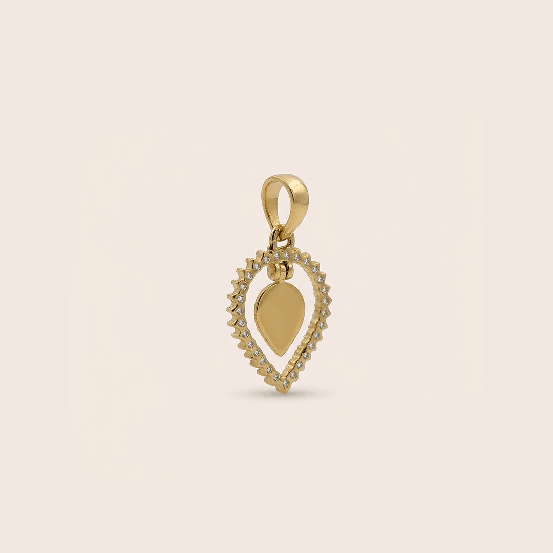 Sacred om leaf diamond pendant in 18k yellow gold