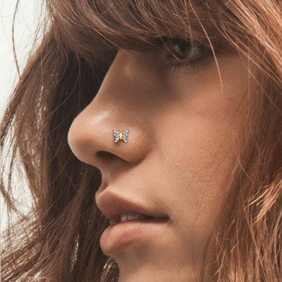 Sparkling diamond butterfly nose pin in 18k yellow gold