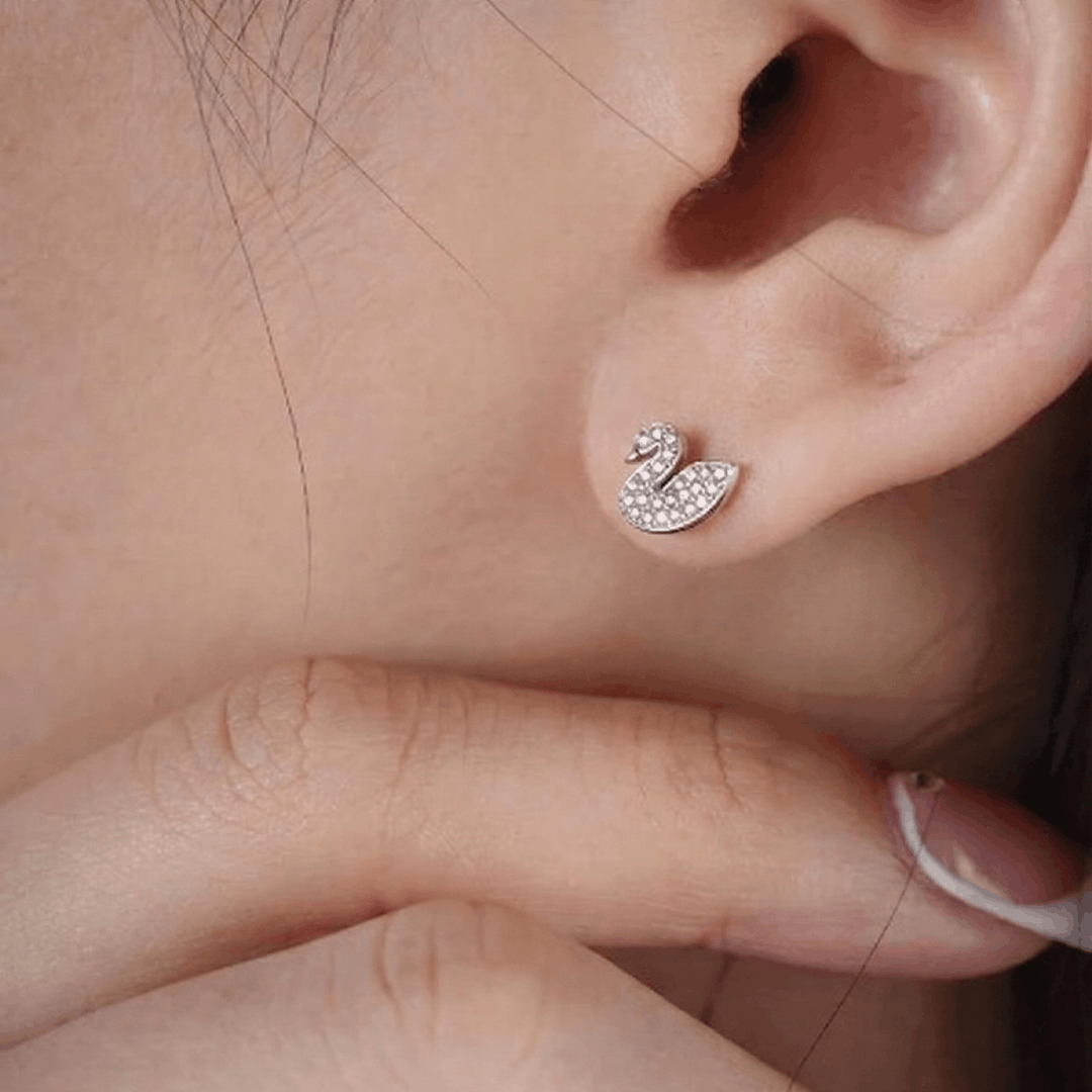 Graceful Swan Pavé Diamond Stud Earrings in 18K Yellow Gold