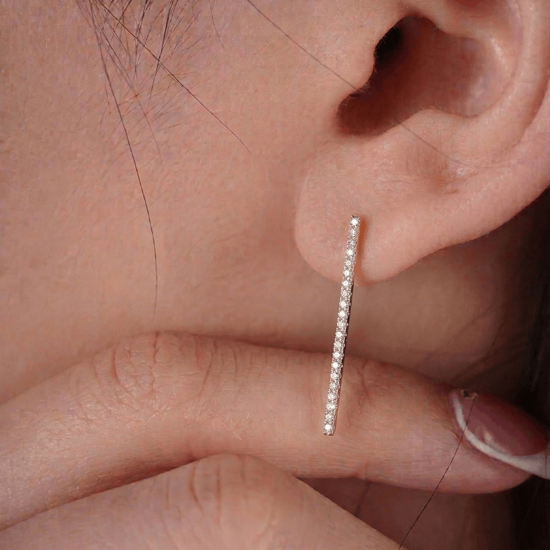 Sleek diamond bar stud earrings in 18k yellow gold