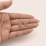 Load image into Gallery viewer, Radiant Sunburst Open Oval Diamond Stud Earrings in 18K Yellow Gold
