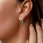 Load image into Gallery viewer, Pear-Cut Synthetic Emerald &amp; Diamond Infinity Swirl Stud Earrings in 18K Yellow Gold
