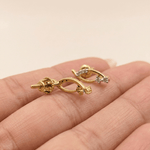 Load image into Gallery viewer, Graceful Interlocking Curve Diamond Stud Earrings in 18K Yellow Gold
