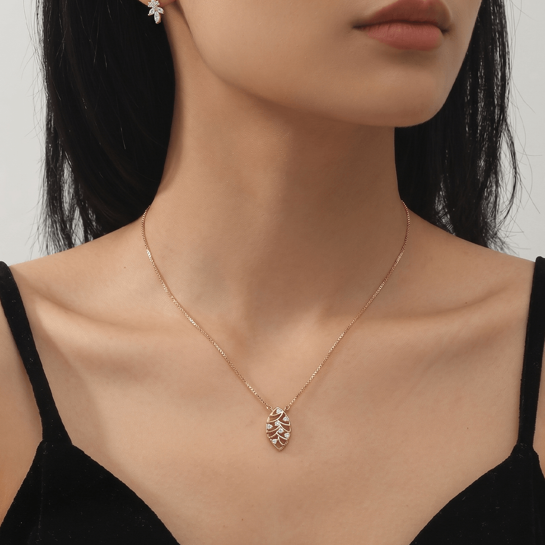 Abstract botanical diamond leaf necklace in 18k yellow gold